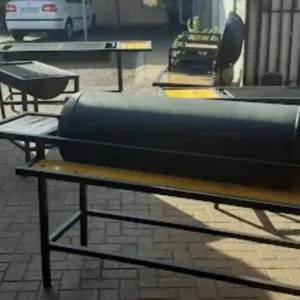 Kwik Braai SA flatbed braai stand on a driveway
